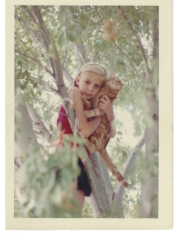 Maeve with cat in tree
